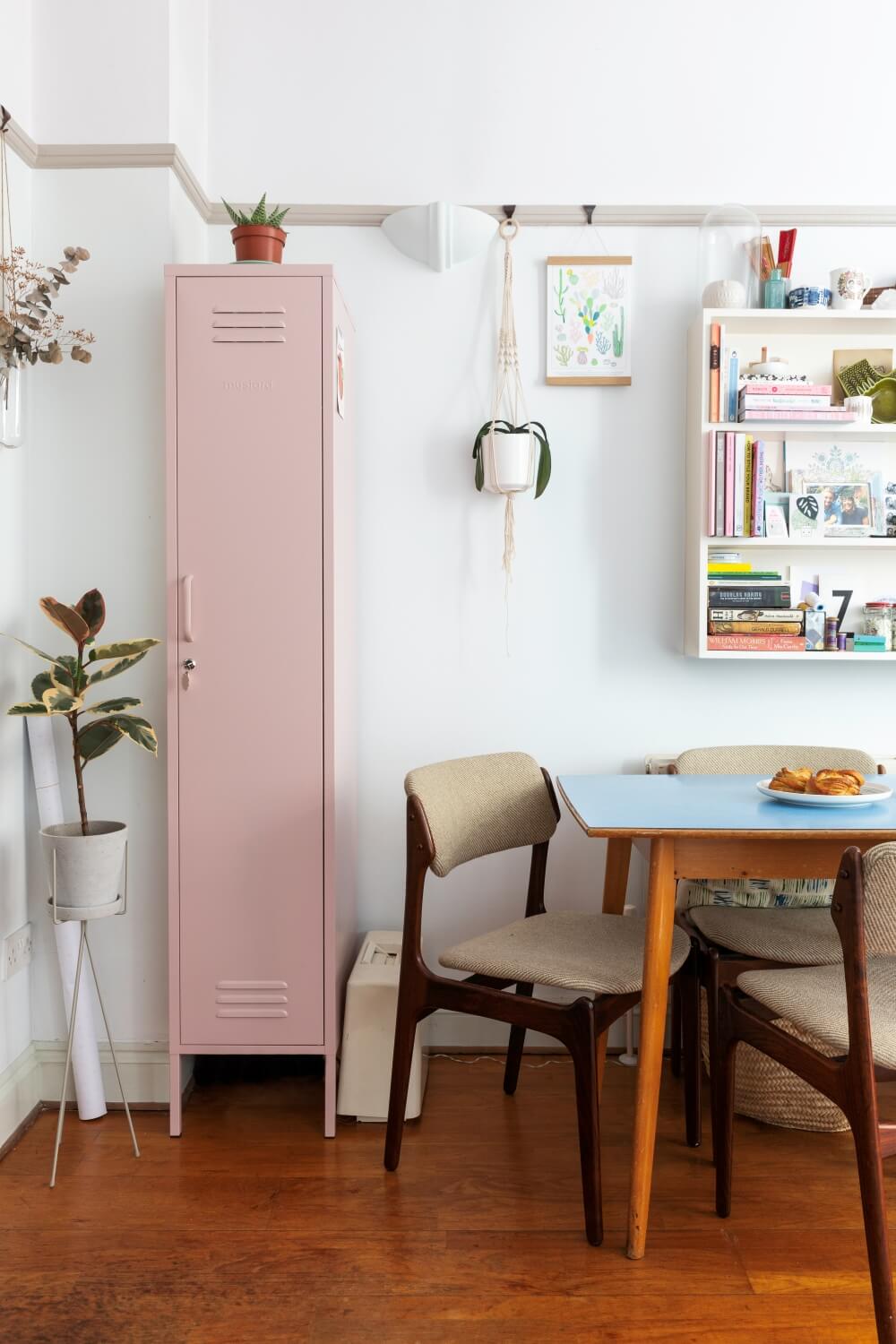 pink Mustard locker in the living room for extra storage next to dining table