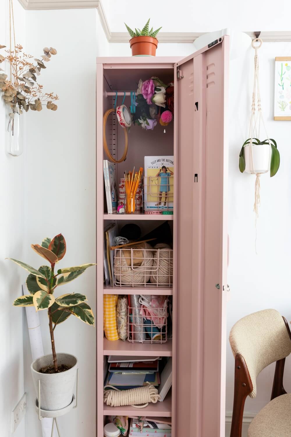 A look inside the pink mustard locker . Shelves of craft storage