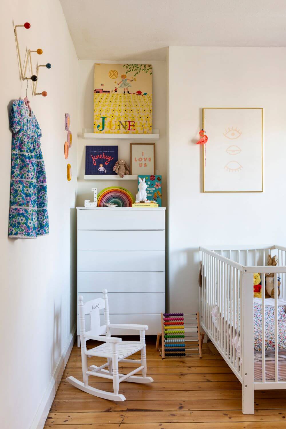 Decorate with Pink Home tour: Girls bedroom with DIY white chest of drawers next to a baby cot and rocking chair