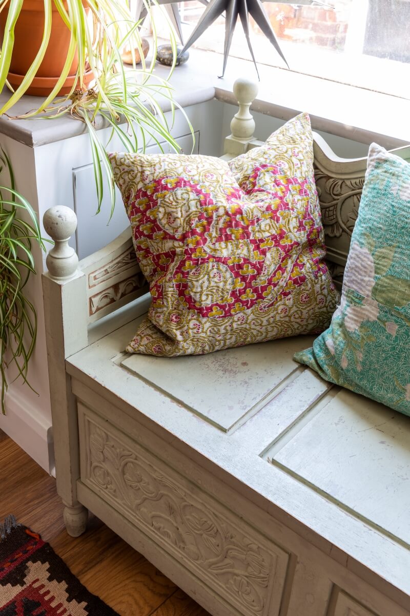 Window seat with desi inspired cushions