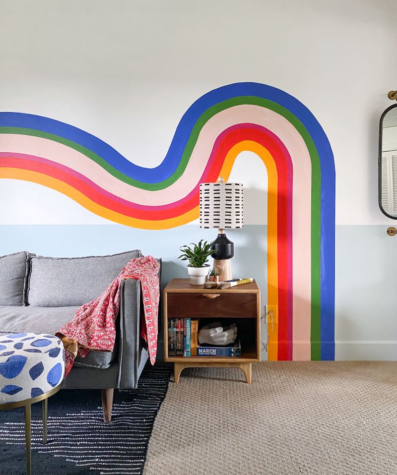 Rainbow effect diy wall mural behind the sofa 