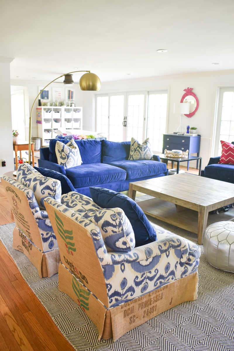 Living room space with blue chairs 