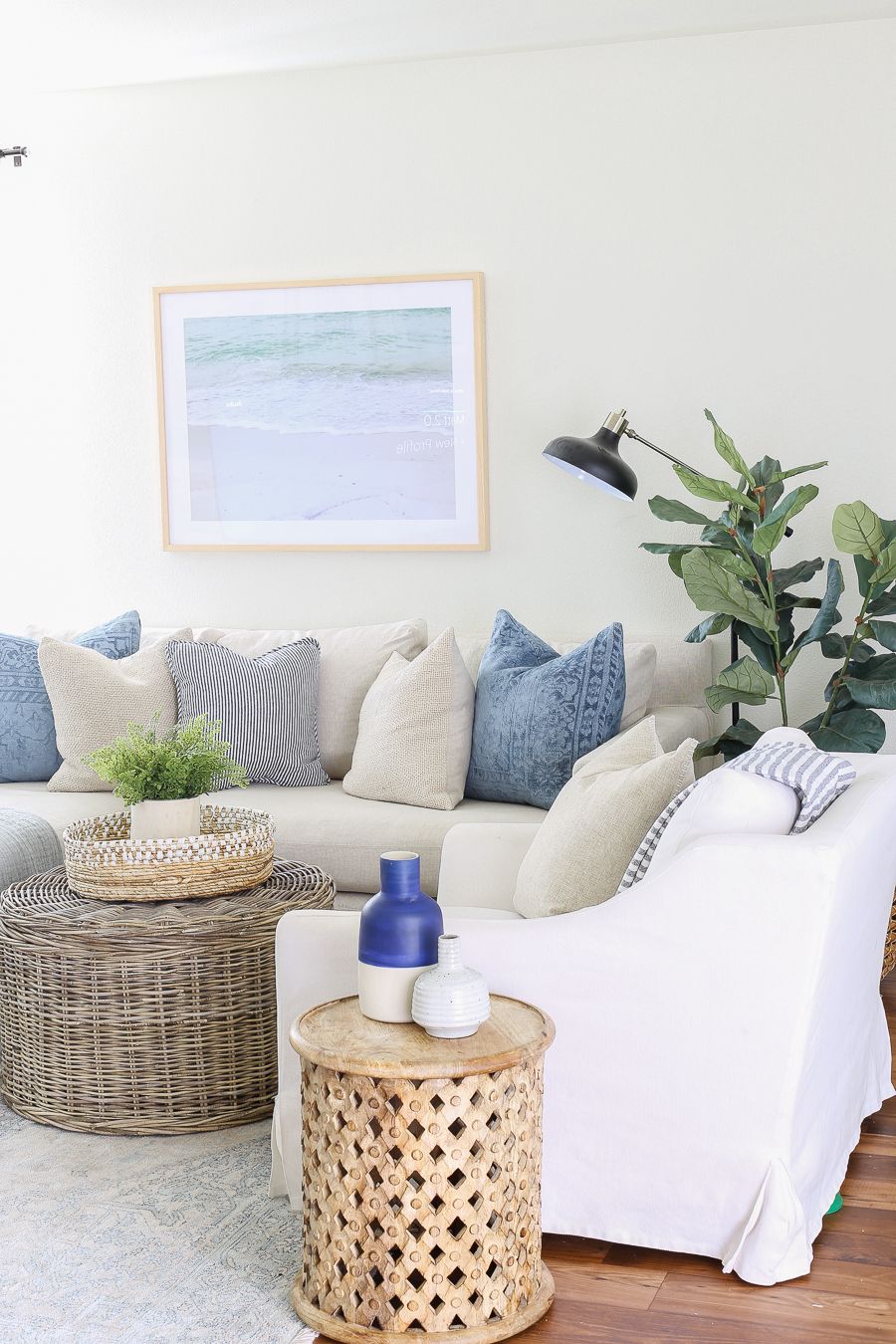 Living room sofa with coastal pillows 